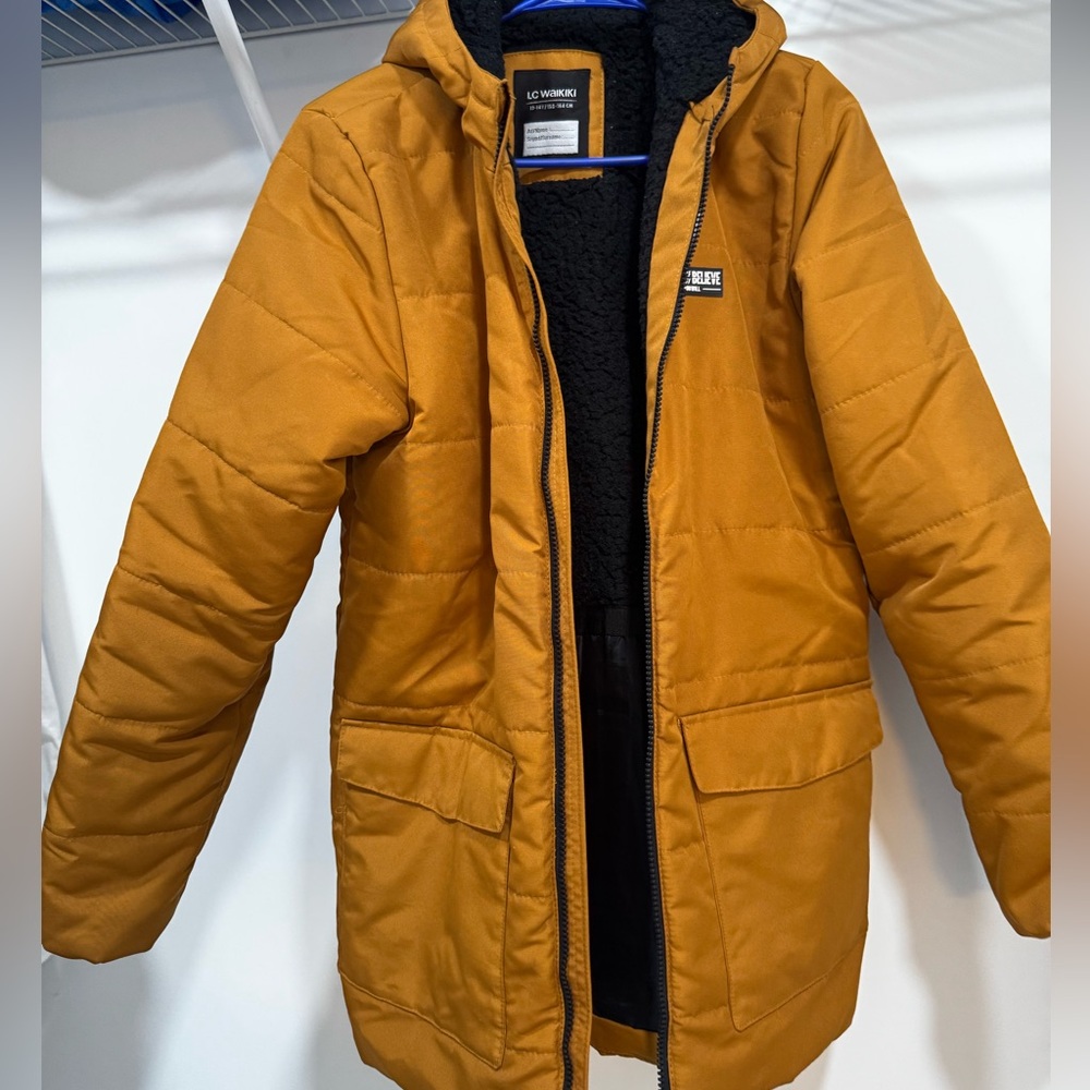 We selling Winter Jacket with super natural and warm wool.Used